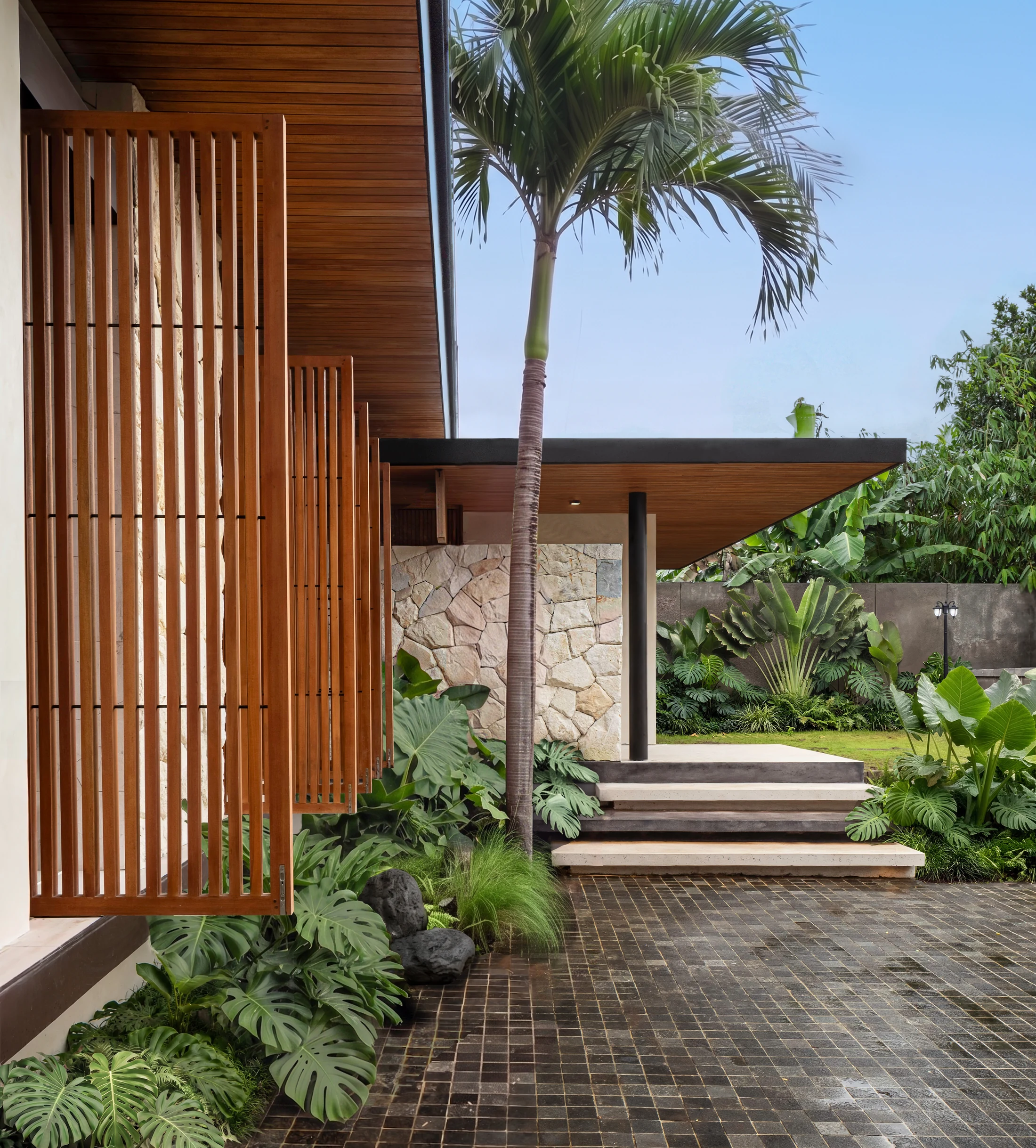 Batuan House timber screen and garden.